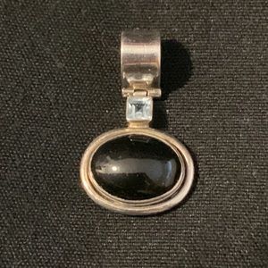 Black onyx with light blue diamond  pendent 925 sterling silver, stamped inside.